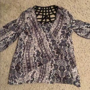 Sheer waist length tunic.